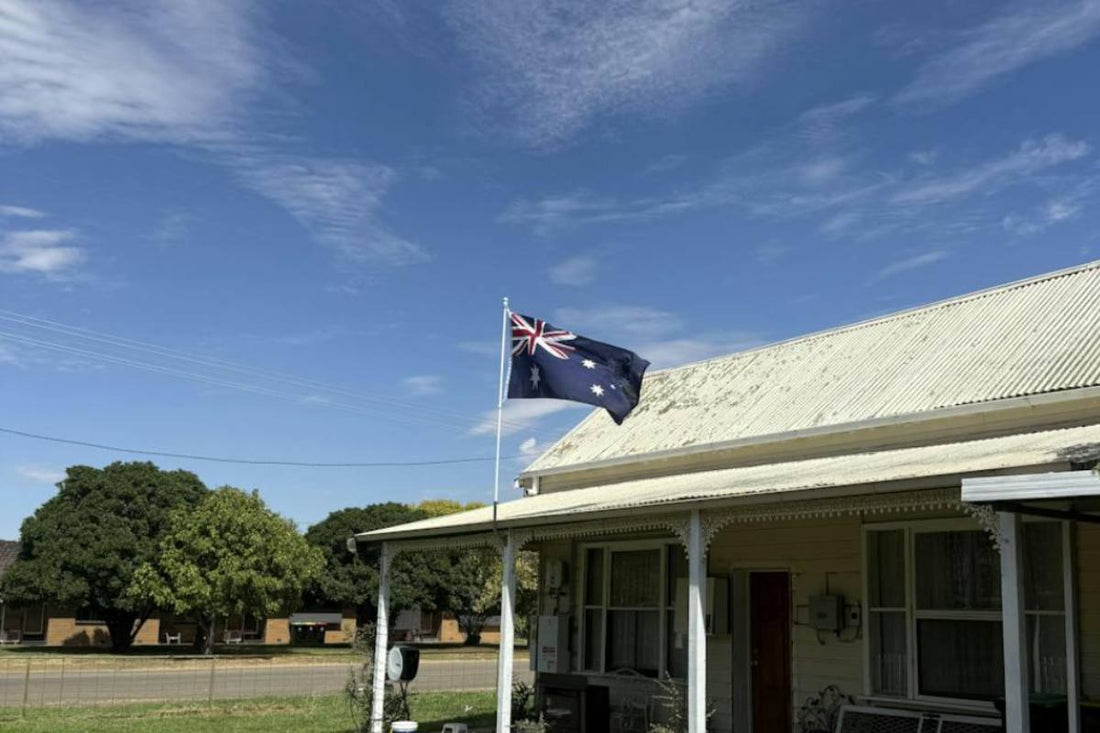 Australian National Flag flying over a house